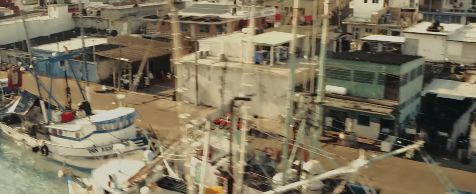 a group of boats docked in a harbor