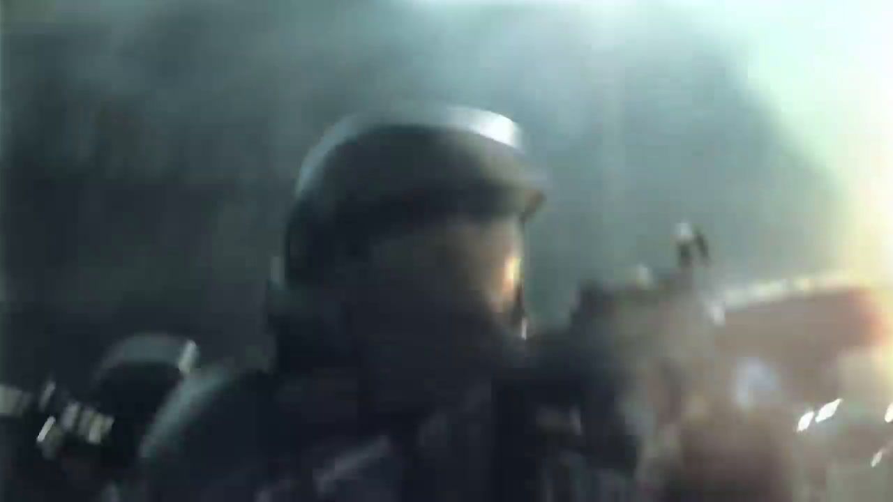 a blurry image of a man wearing a helmet