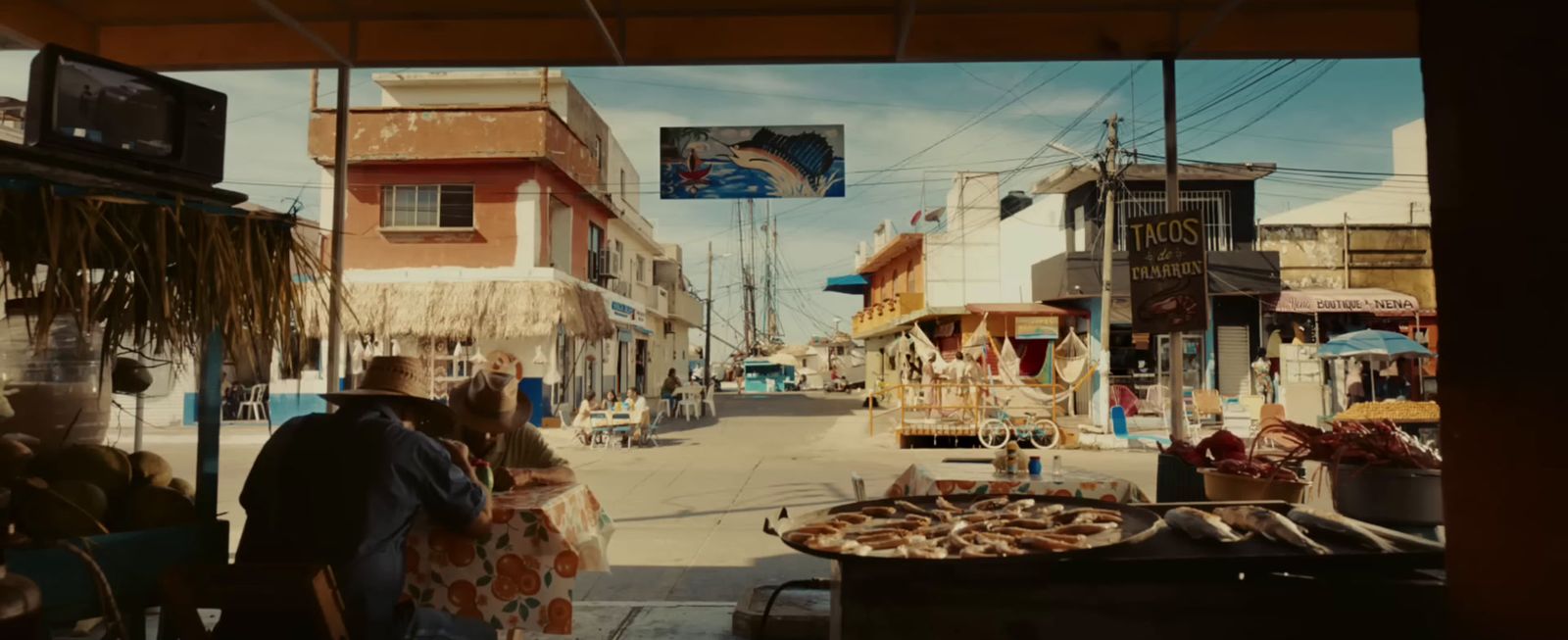 a man and a woman walking down a street