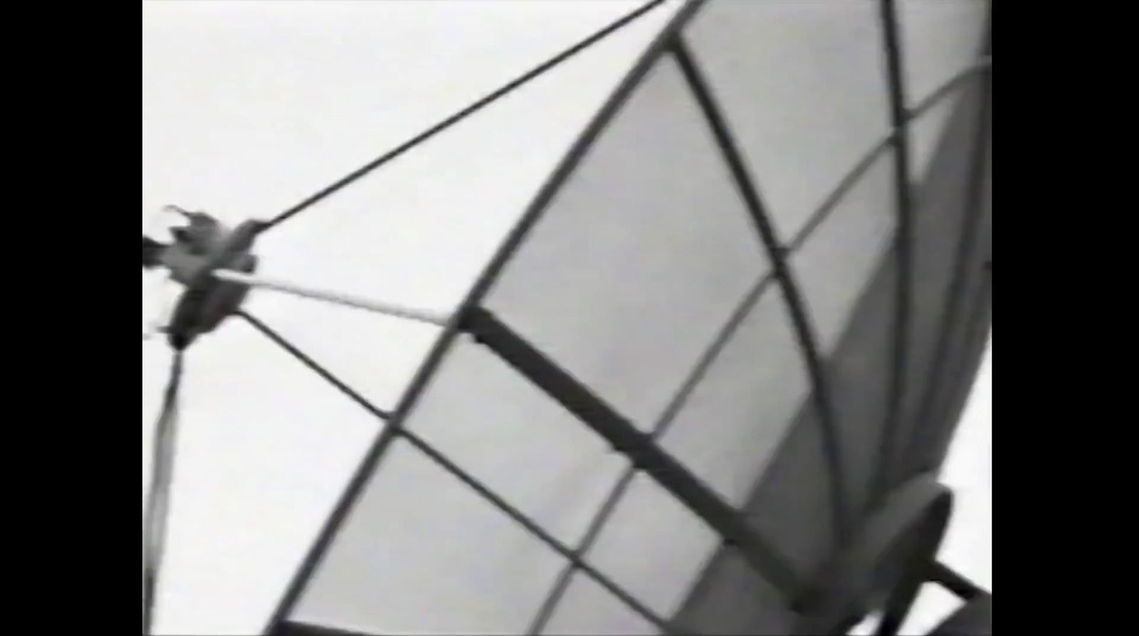 a black and white photo of a wind sail