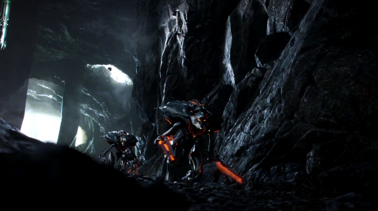 a group of people standing in a cave