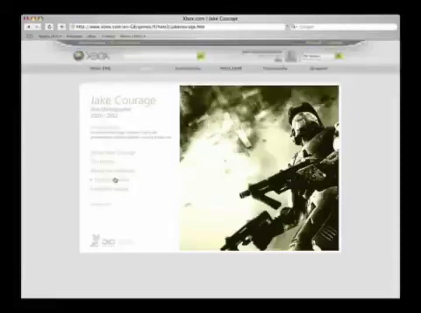 a computer screen with a picture of a man holding a gun