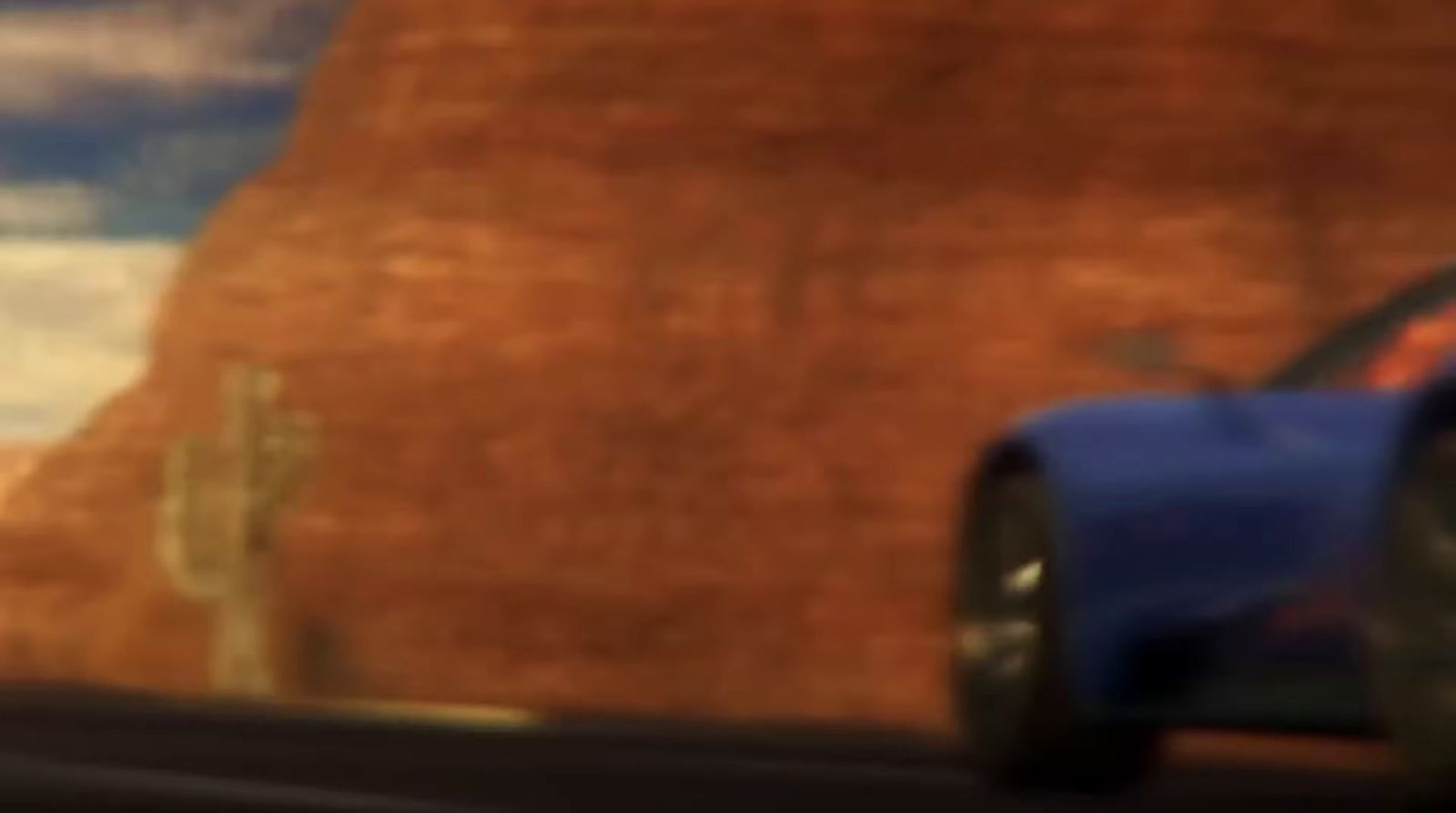 a blurry image of a toy car on a road