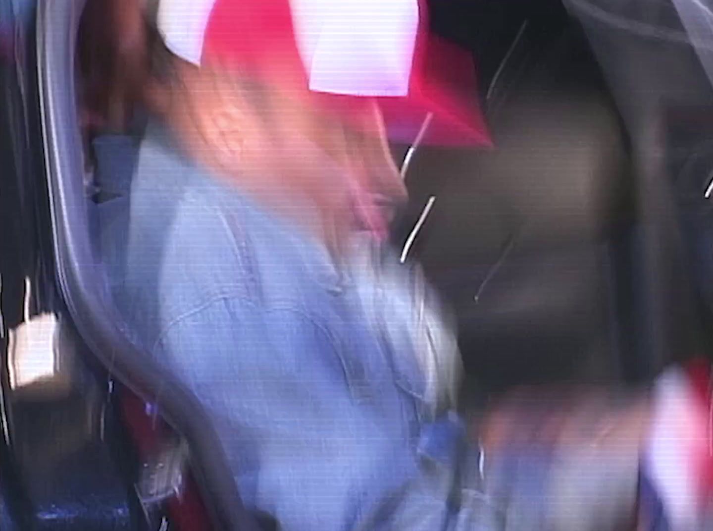 a blurry photo of a person in a car