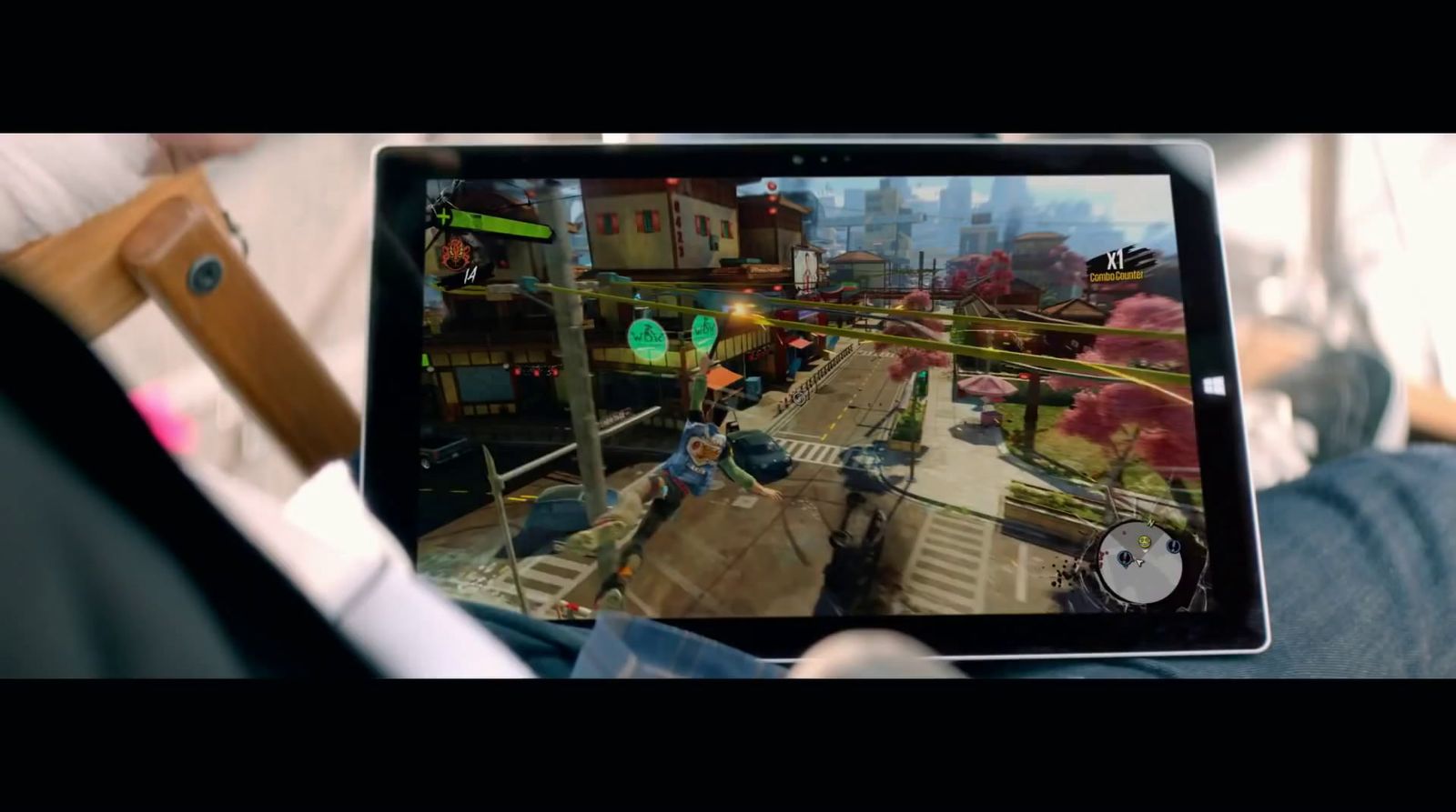 a person is playing a video game on a tablet