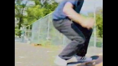 a man riding a skateboard down the side of a ramp