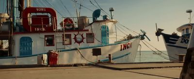 a couple of boats that are sitting in the water