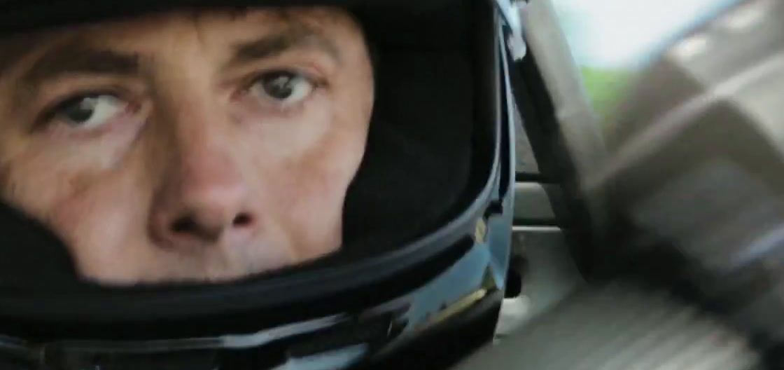 a close up of a person wearing a helmet