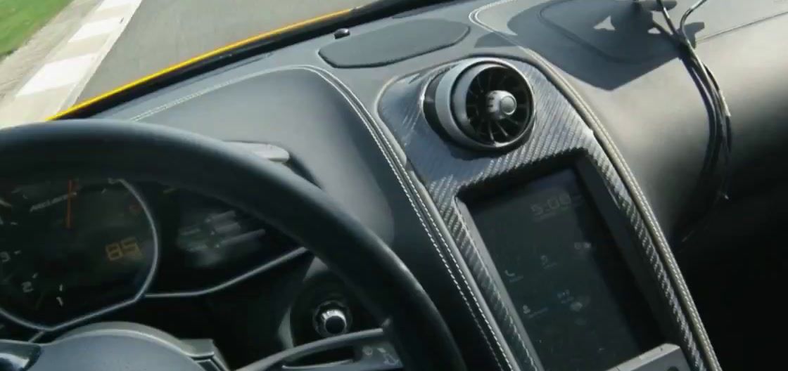 the dashboard of a car on a road