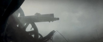 a large metal object in the middle of a foggy field