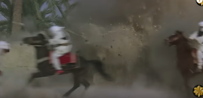 a group of men riding on the backs of horses