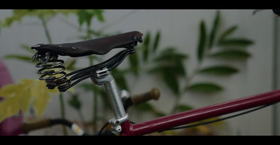 a close up of a bike with a bunch of keys on it