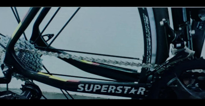 a close up of a bike with the words superstar on it