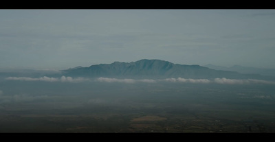 a view of a mountain from an airplane