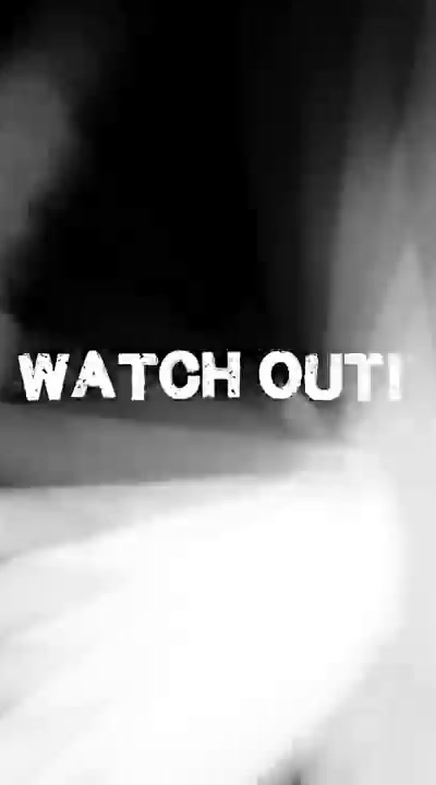 a black and white photo with the words watch out