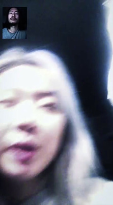 a blurry photo of a woman making a face