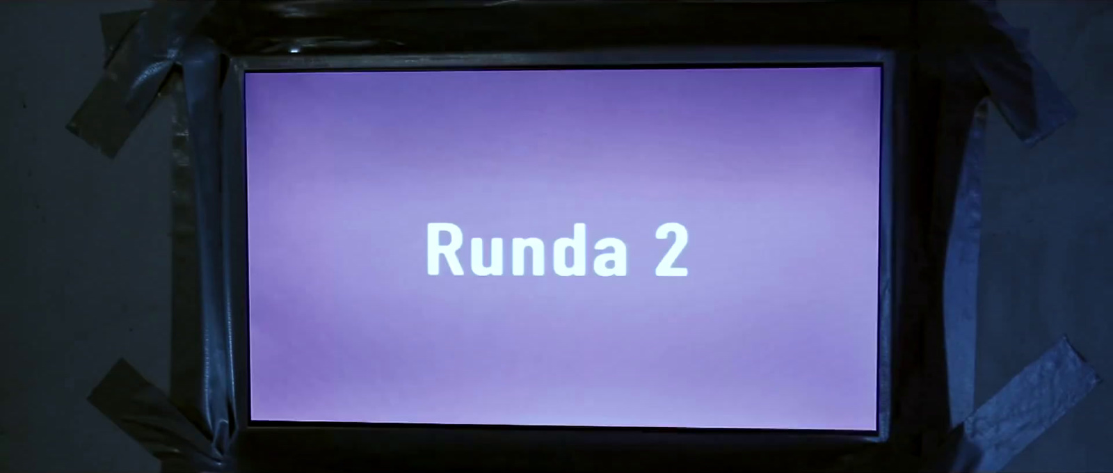 a purple screen with the words runda 2 on it