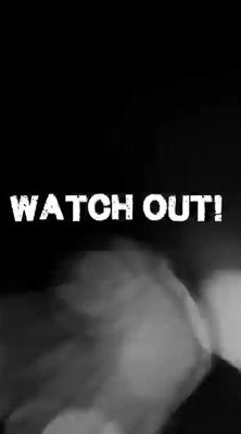 a black and white photo with the words watch out