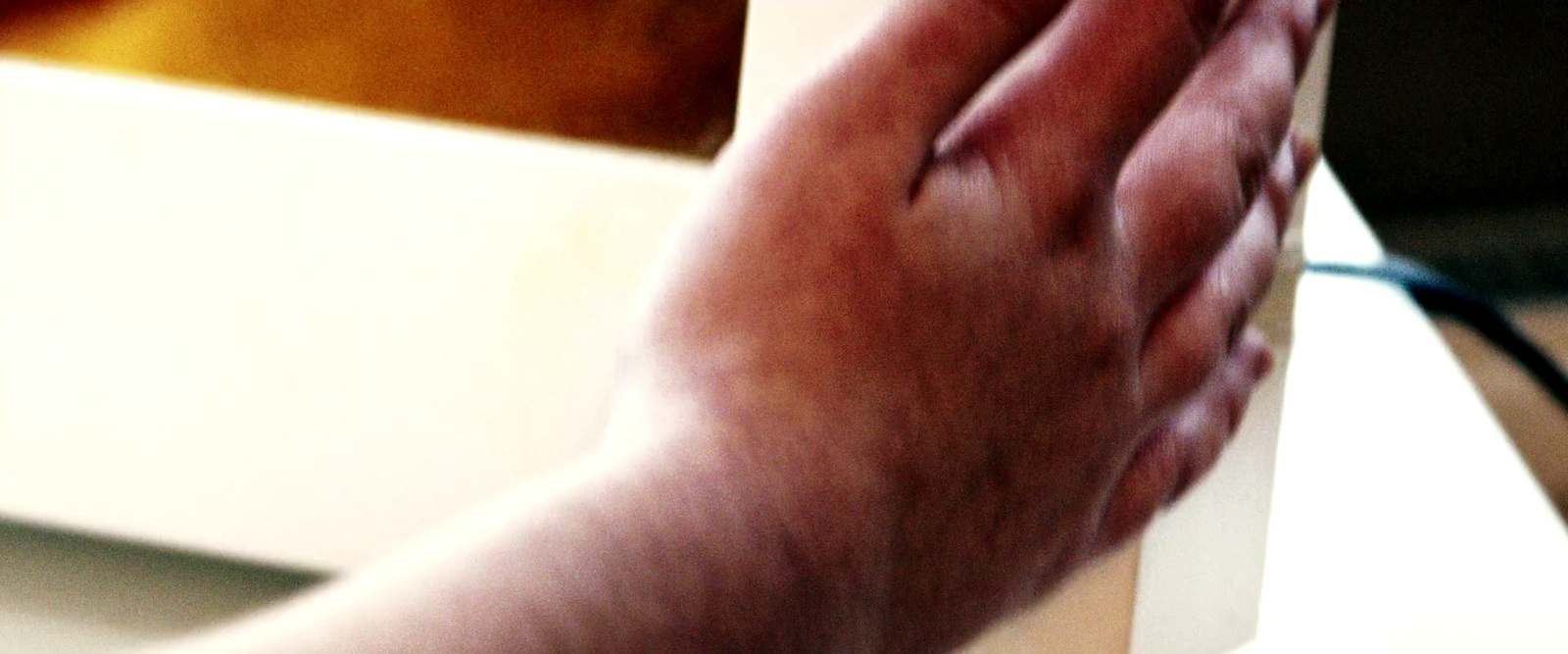 a close up of a person's hand holding something