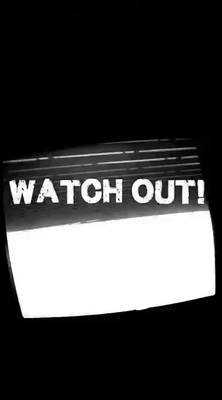 a black and white photo of a watch out sign