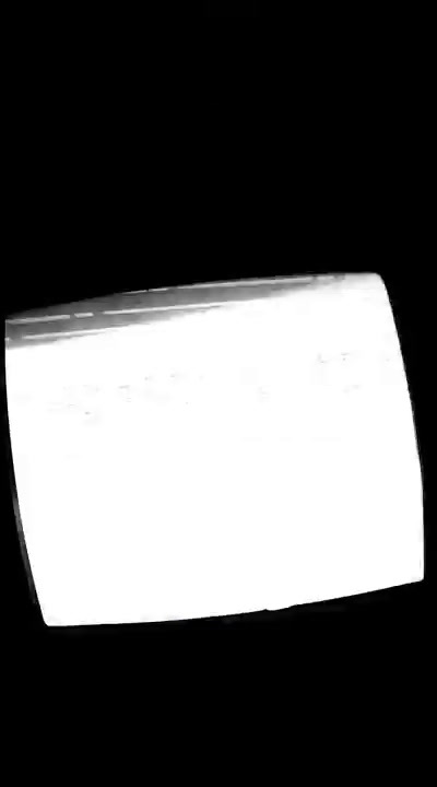 a black and white photo of a toilet paper dispenser