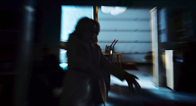 a blurry image of a person in a room