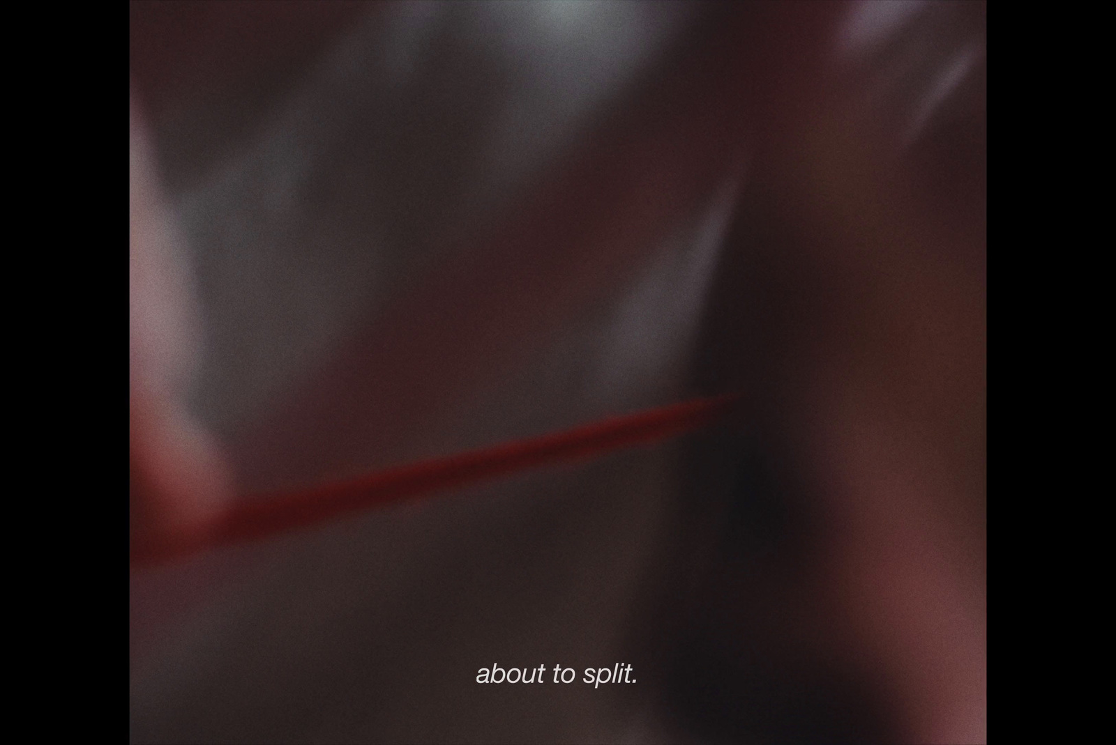 a blurry photo of a red object with the words live on it