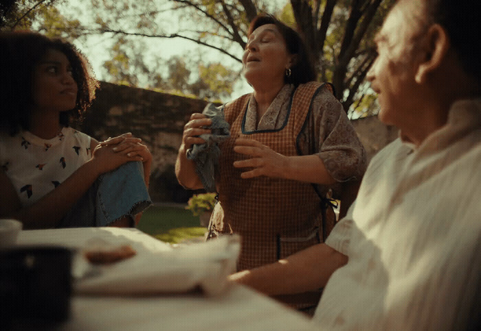 a group of people sitting around a table