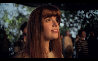 a close up of a person with long hair