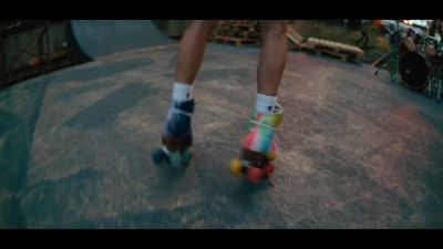 a person riding a skateboard down a ramp