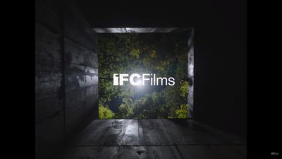 a dark room with a light that reads ifc films