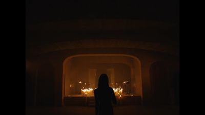 a person standing in front of a fire place