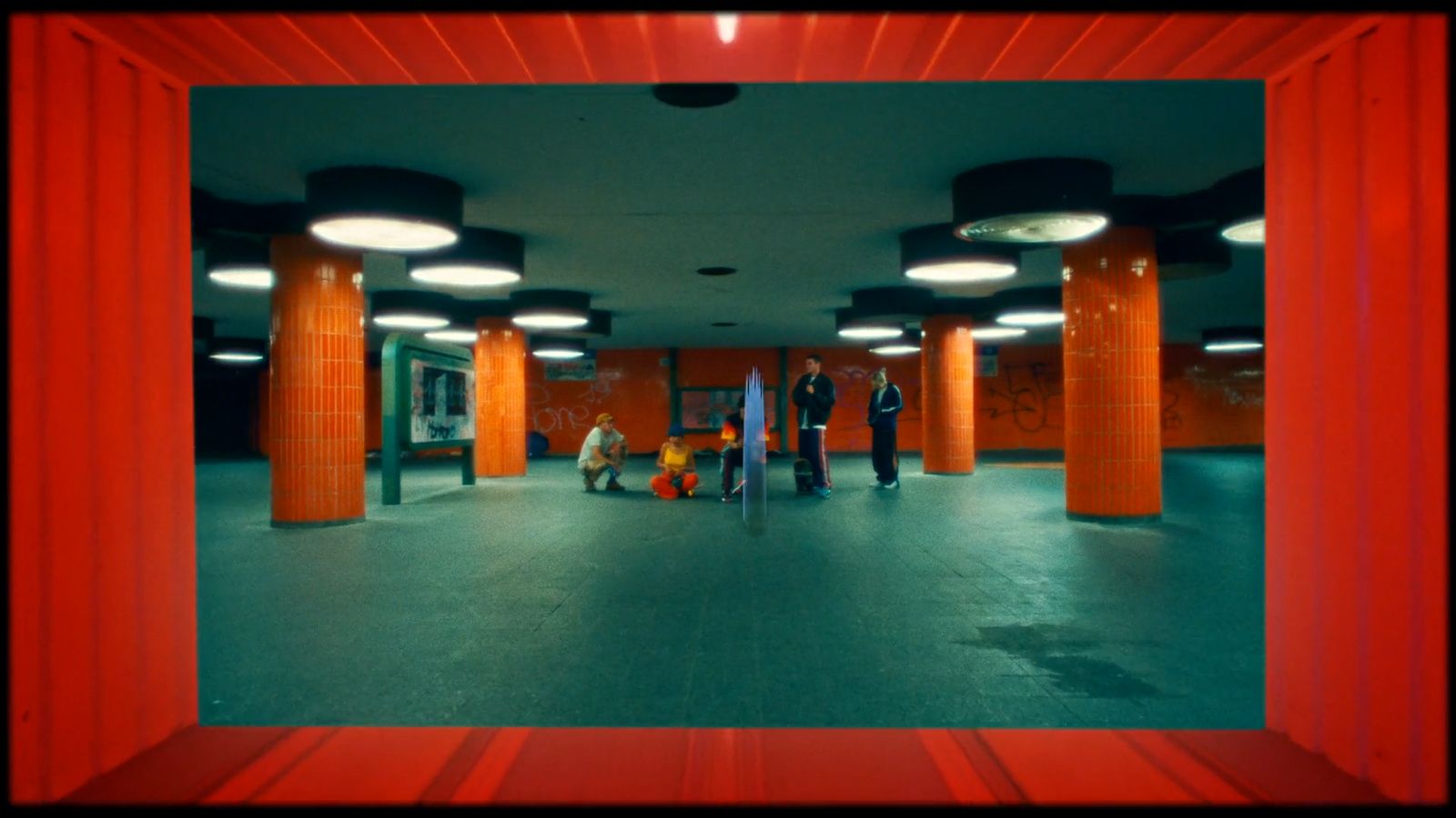 a group of people standing in a hallway