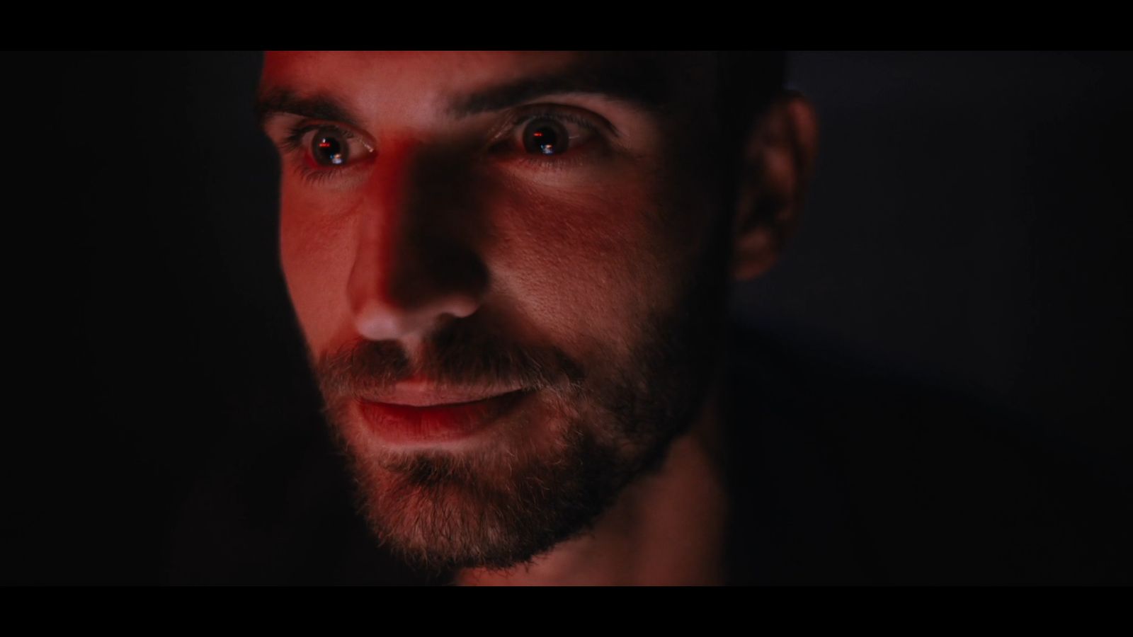 a close up of a man with a beard