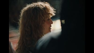 a close up of a person with long hair