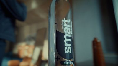 a bottle of water sitting on top of a table