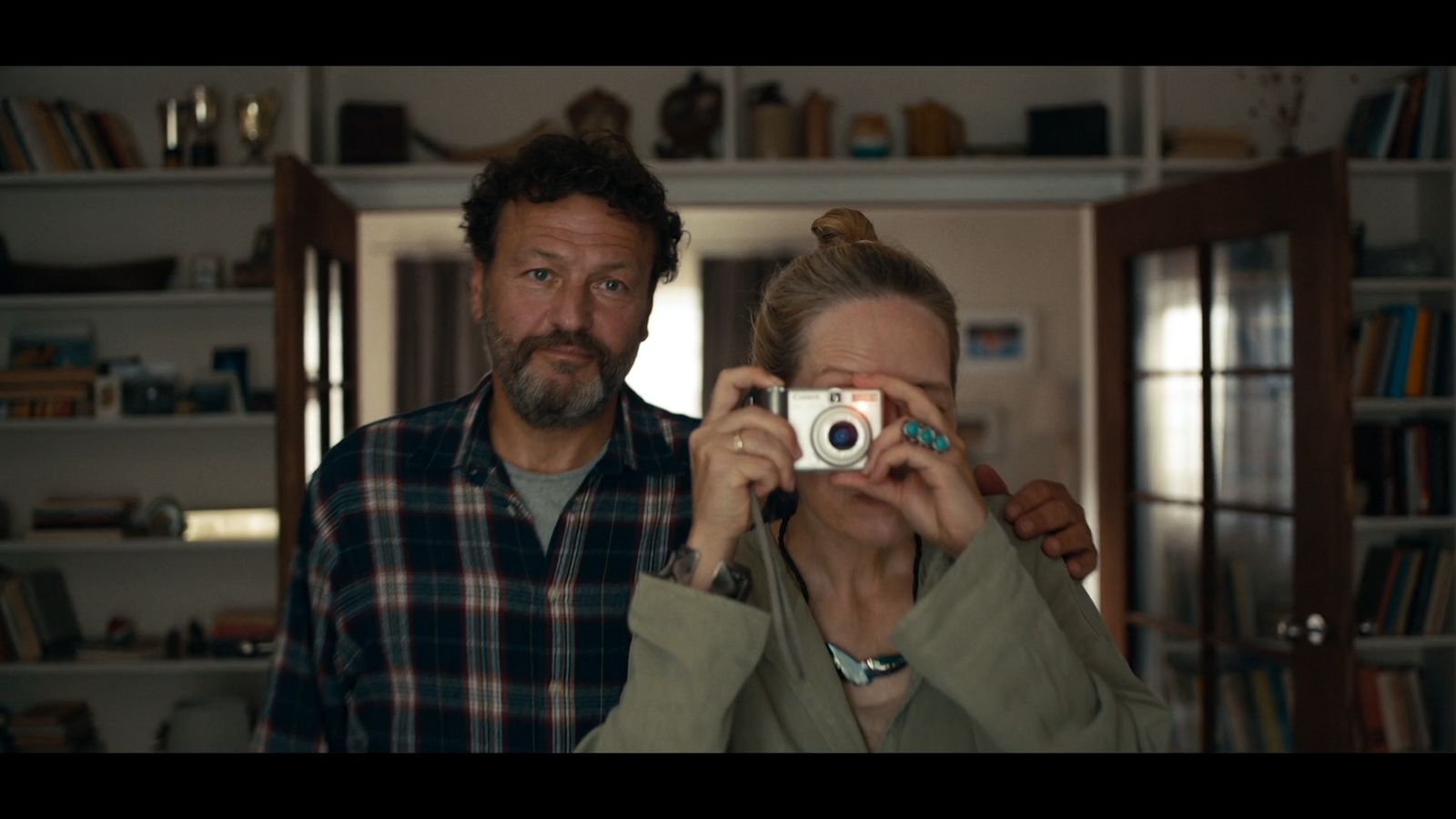 a man and a woman taking a picture of themselves