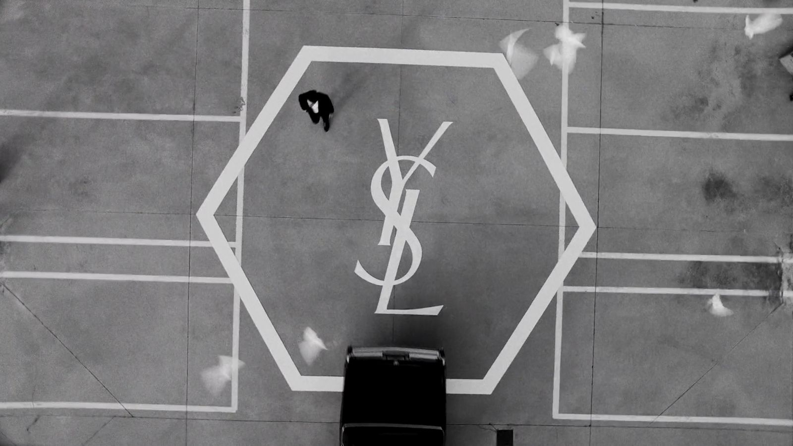 a black and white photo of a street sign