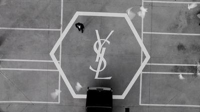 a black and white photo of a street sign