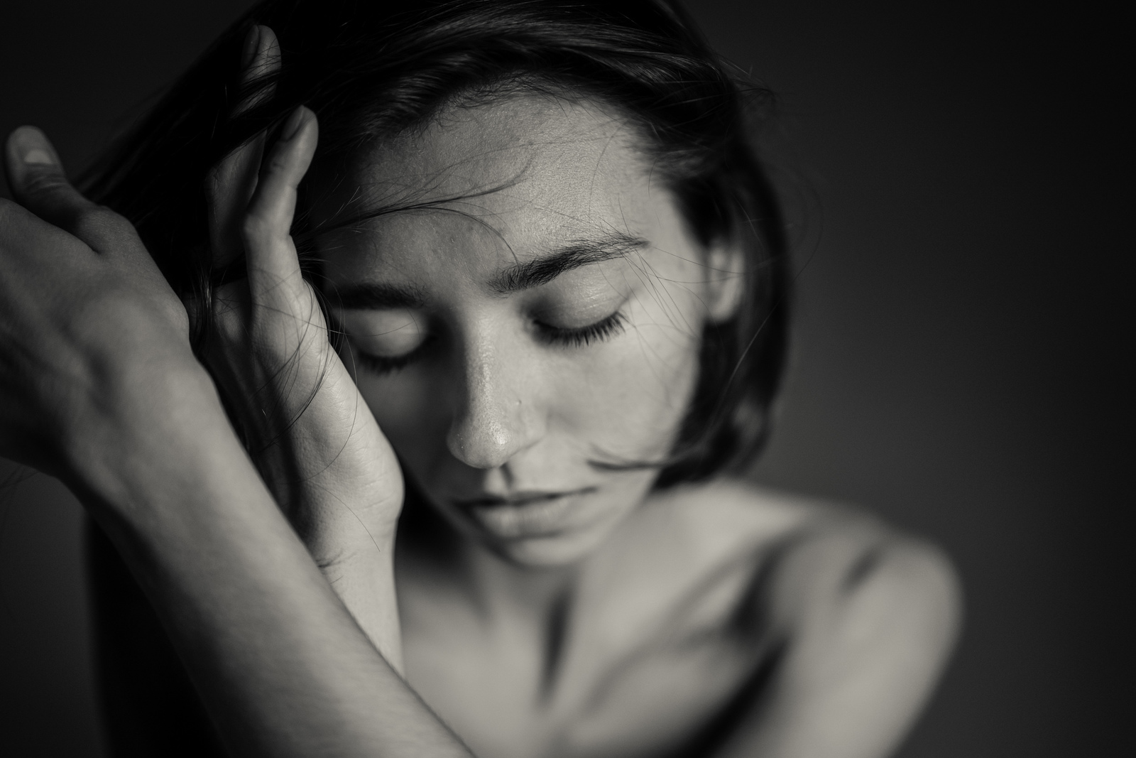 a black and white photo of a naked woman