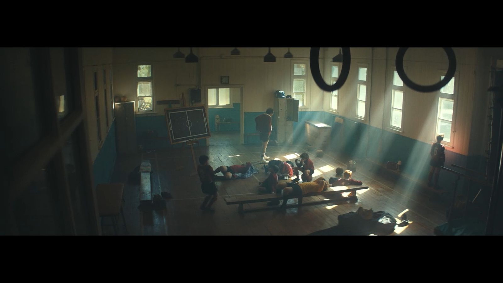 a group of people sitting on a couch in a room