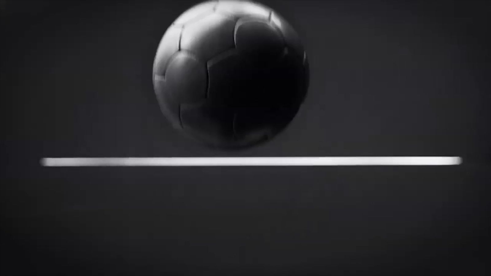 a black and white photo of a soccer ball