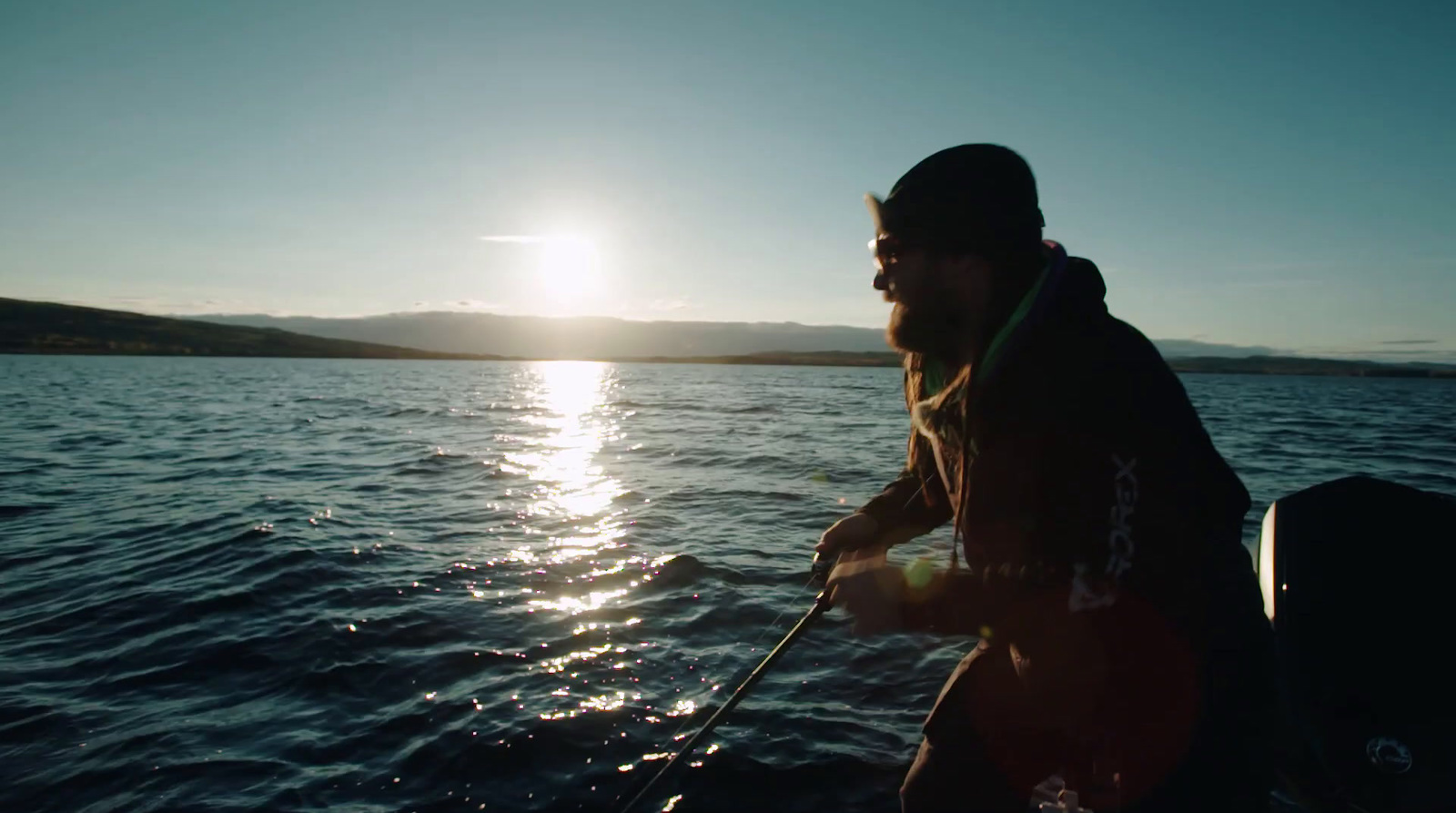 a man on a boat in the water