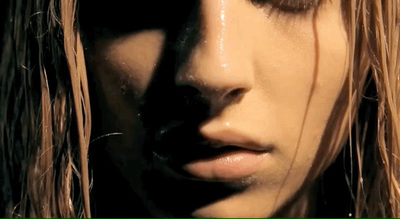 a close up of a person with long hair