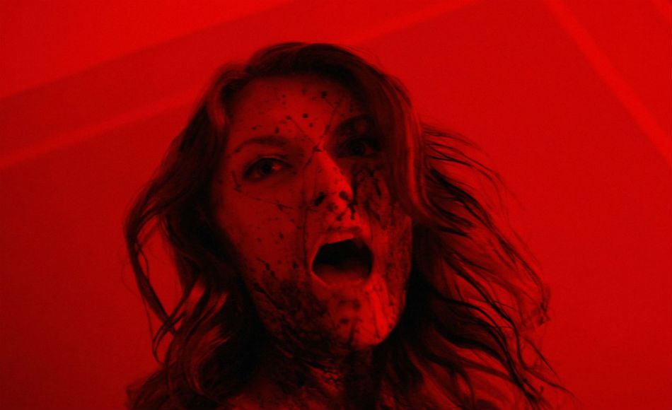 a woman with blood all over her face