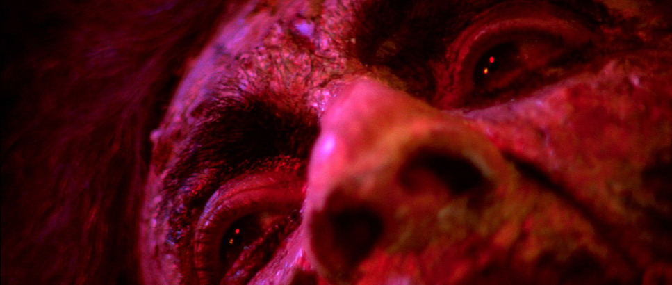 a close up of a person's face with red light