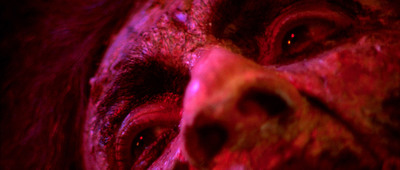 a close up of a person's face with red light