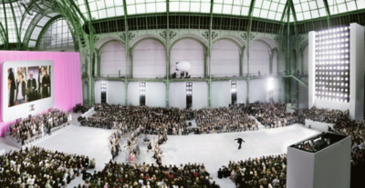 a large crowd of people in a large building