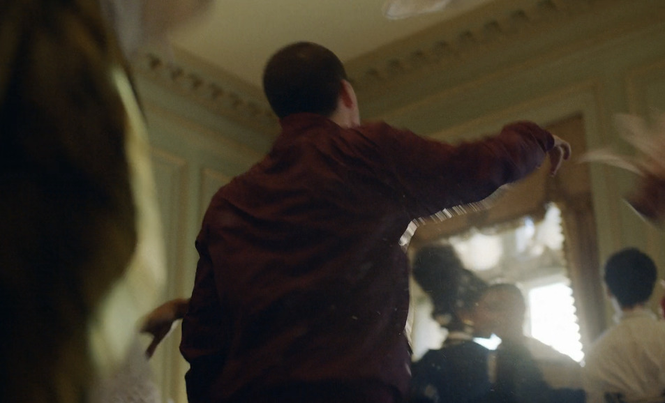 a group of people dancing in a room