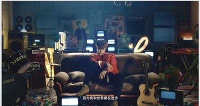 a person sitting on a couch in a room